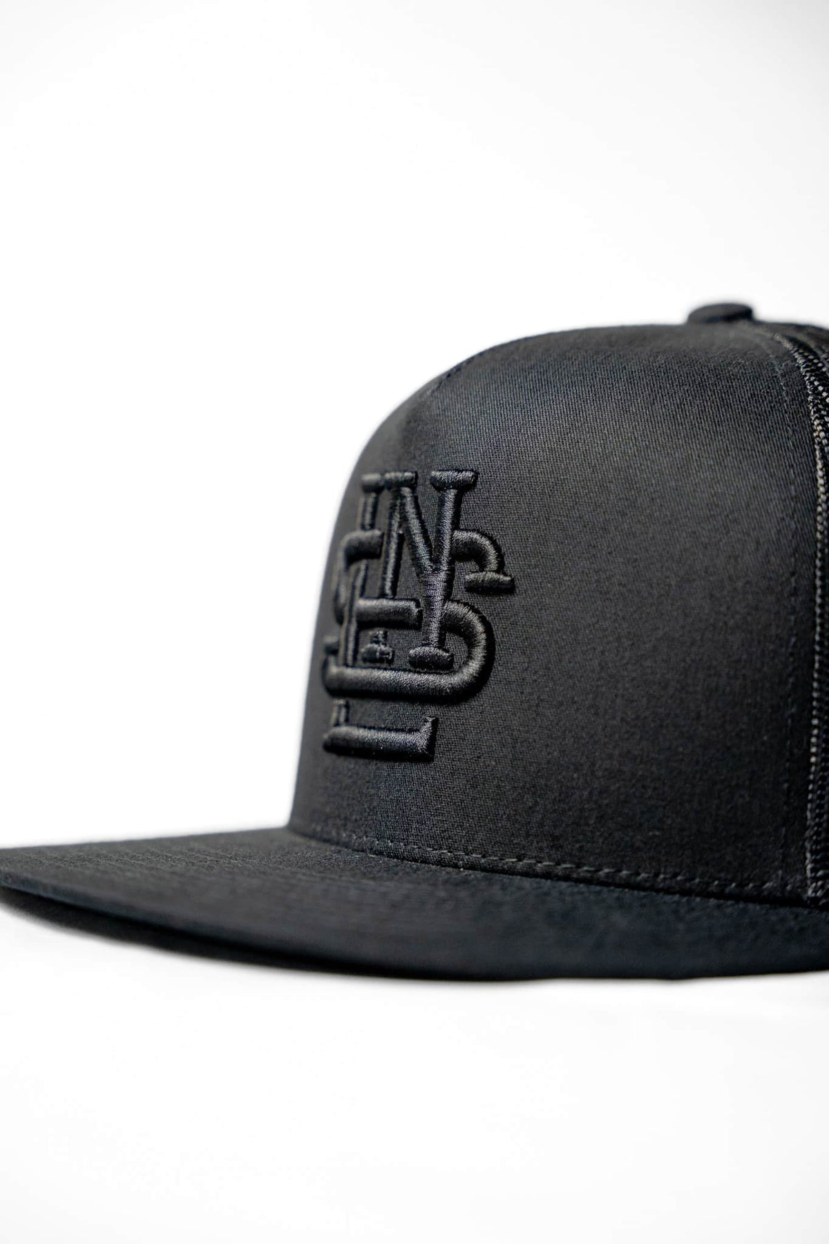 LNS Embroidered Monogram Trucker - Blackout